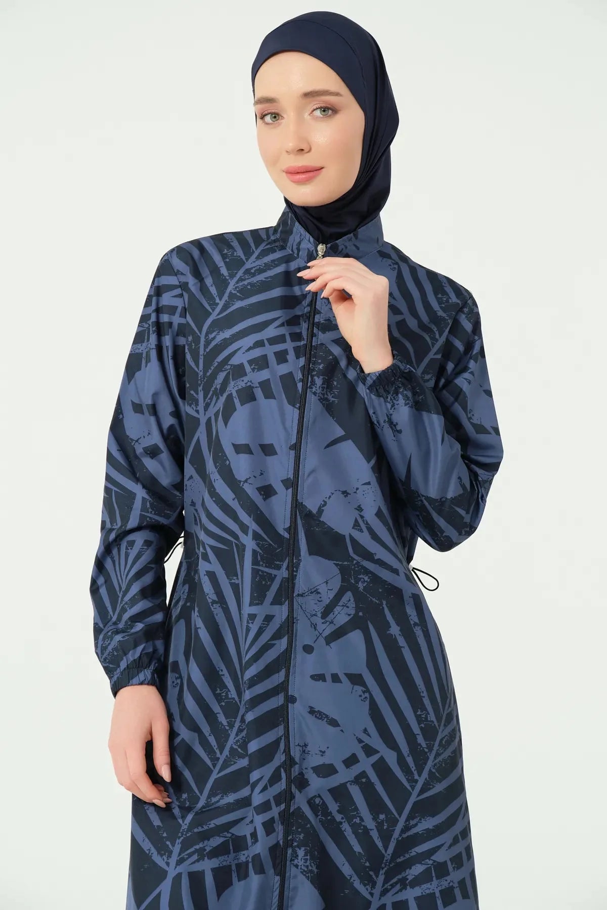 Close-up of navy blue and black abstract print burkini zipper