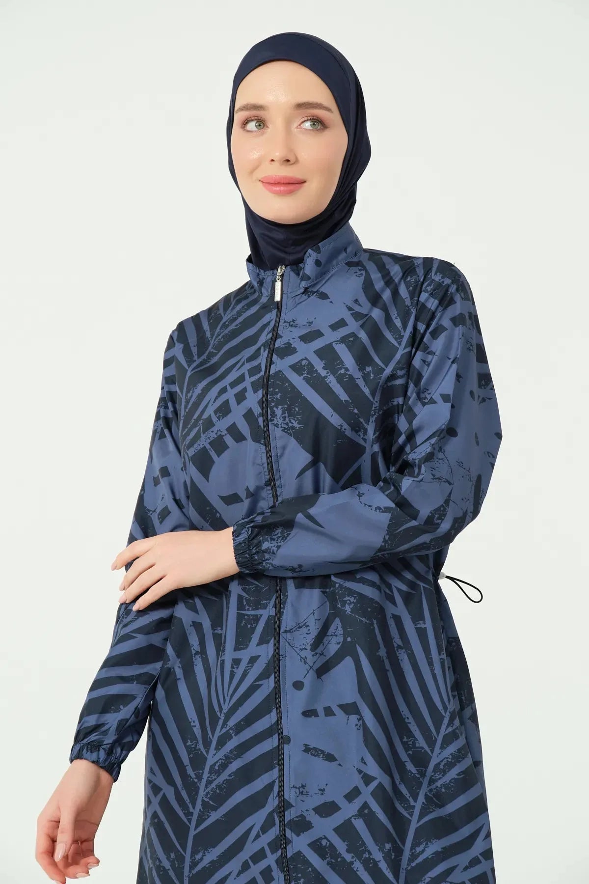 Close-up of navy blue and black abstract print burkini fabric