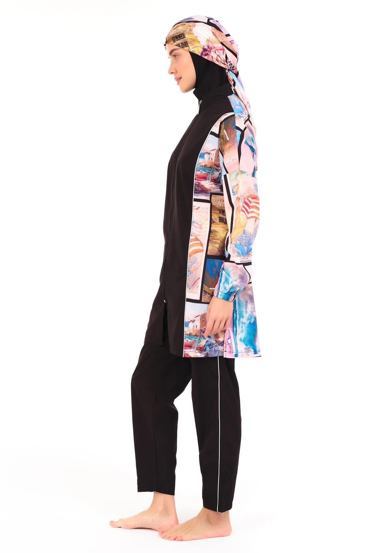Black burkini with colorful patterned sleeves and hijab, side profile.