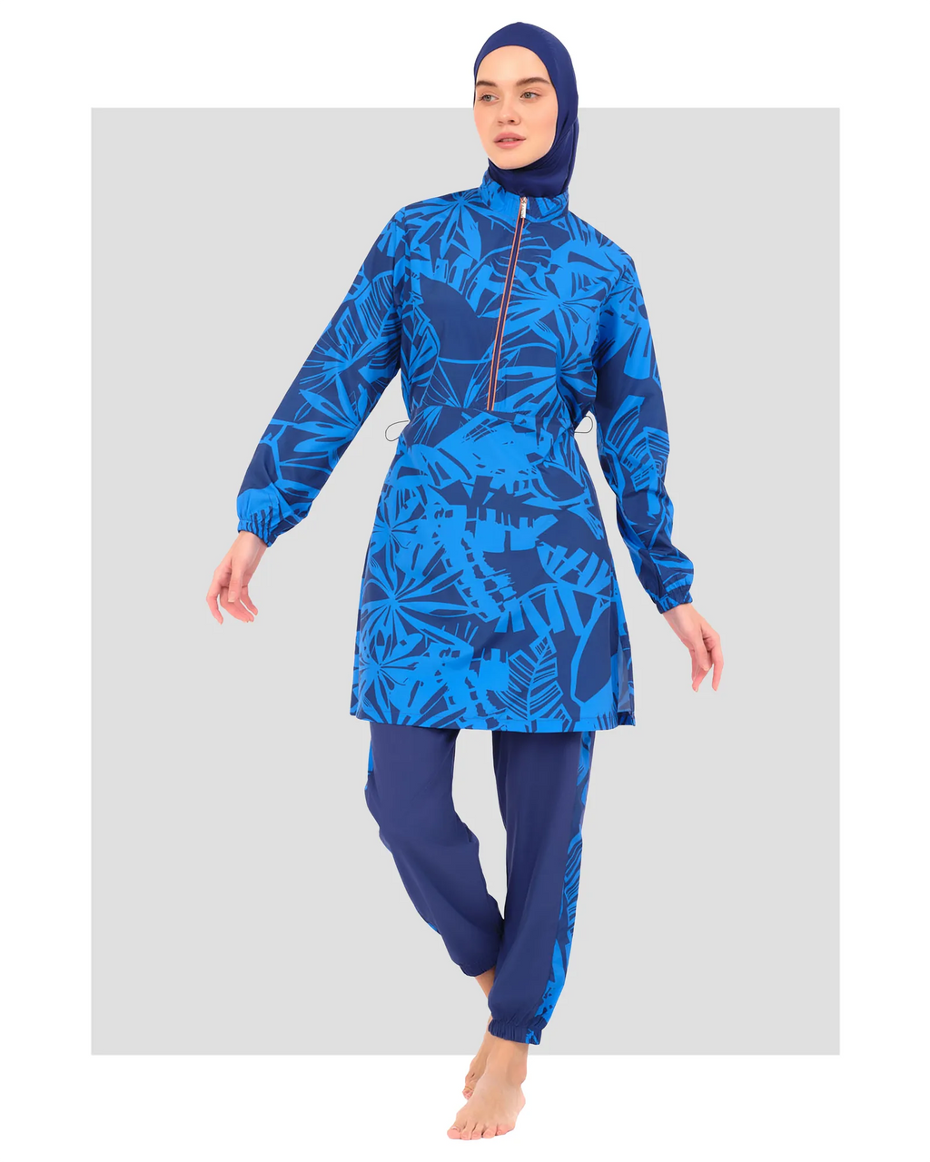 Blue patterned burkini set front view on a white background.