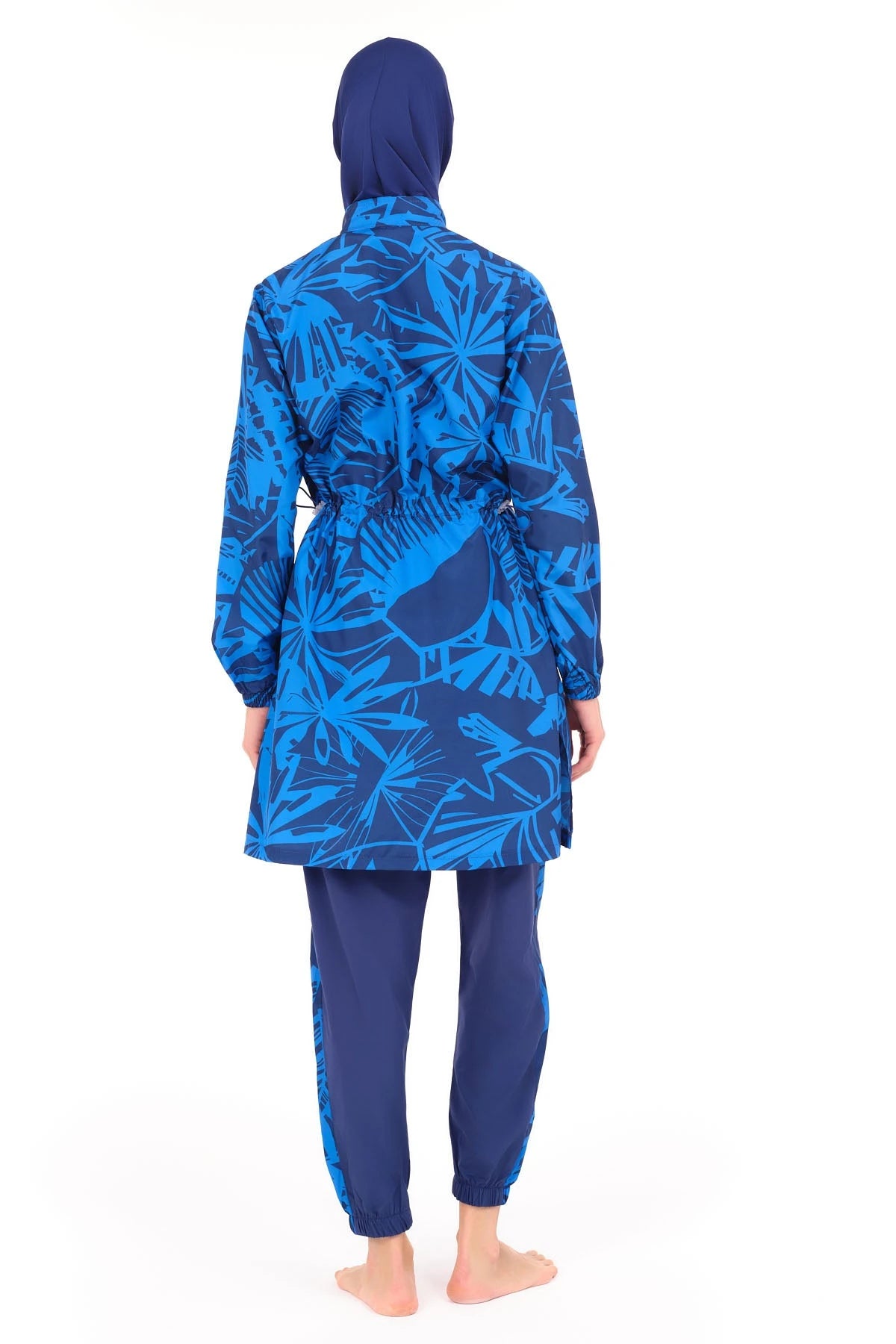 Blue patterned burkini set back view showing adjustable drawstring waist.