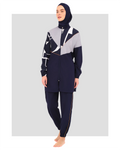 Navy burkini set with geometric print top and plain pants, front view.
