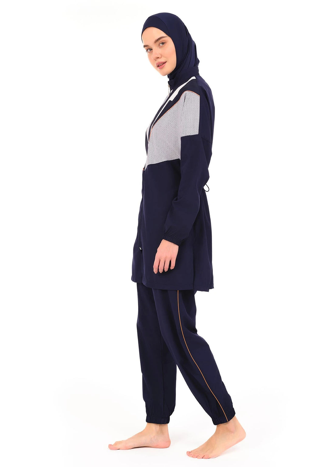 Navy burkini set with geometric print top, side profile on white background.