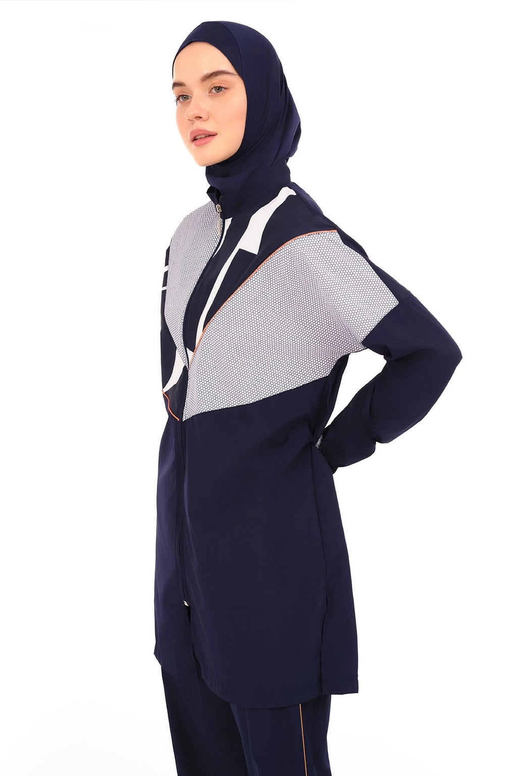 Close-up of navy burkini top with geometric print and high neck.