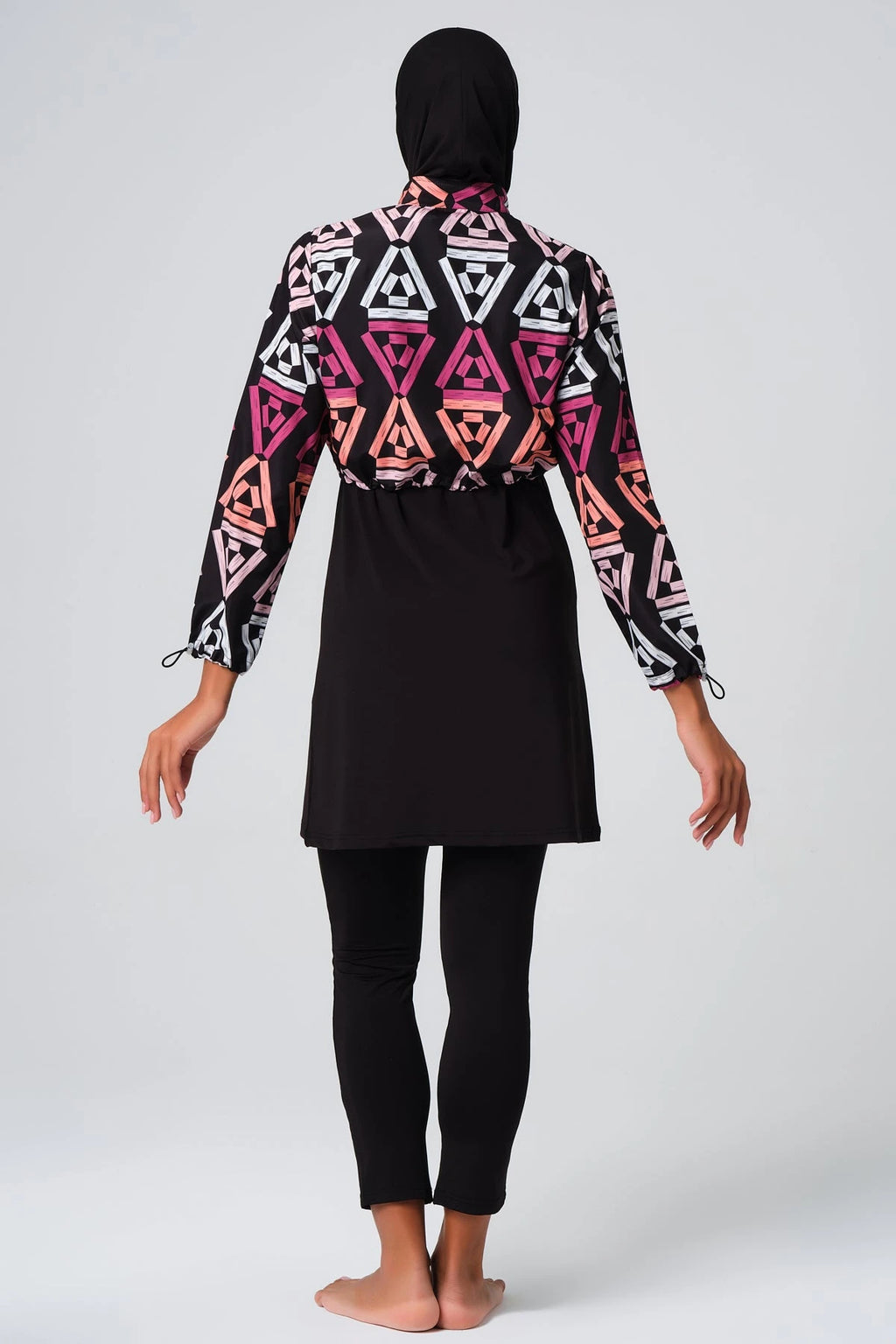 Full coverage modest swimsuit set, back view, geometric print jacket.