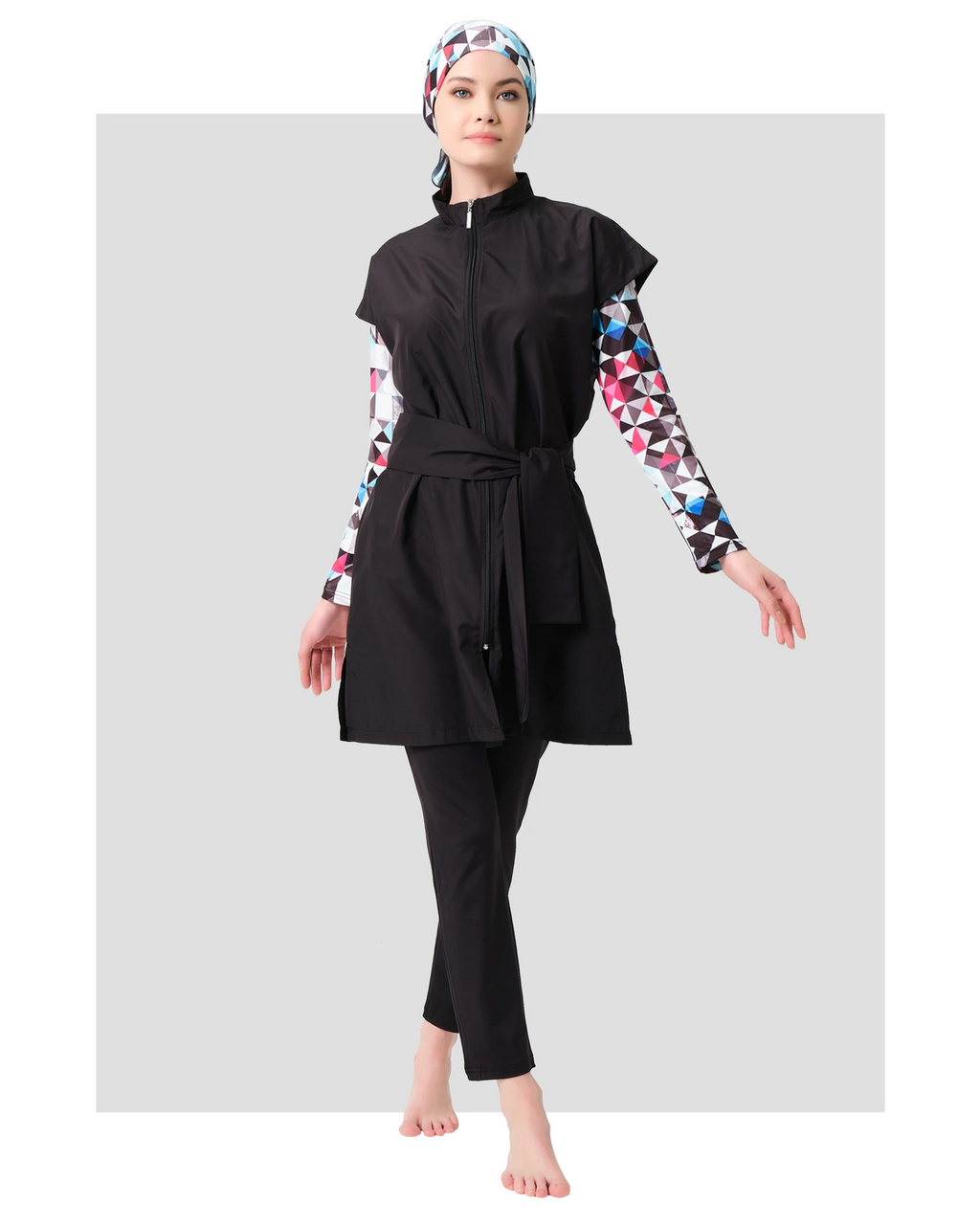 Black layered burkini with geometric print sleeves and matching hijab.