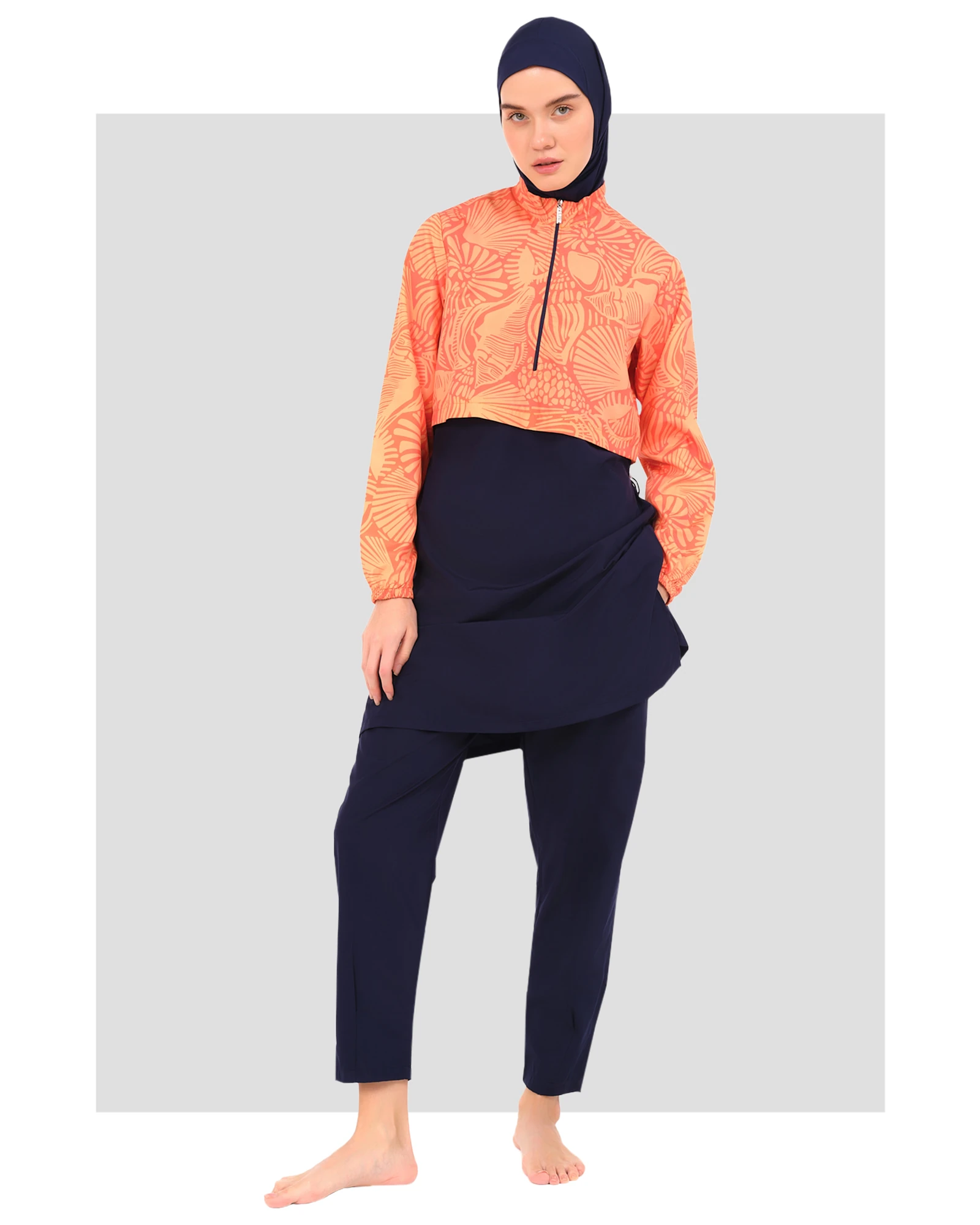 Model wearing sunburst active burkini set front view.