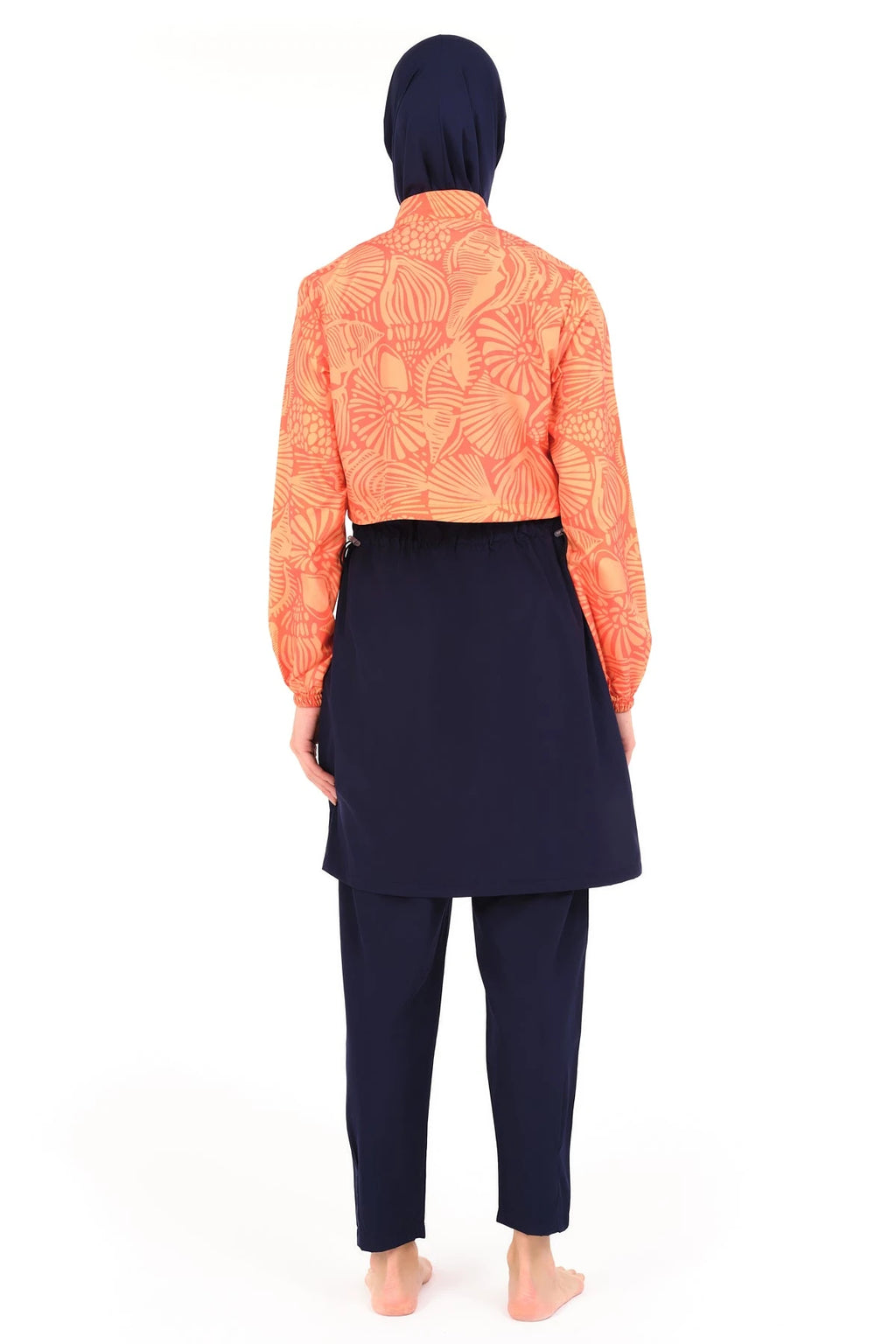 Model wearing sunburst active burkini set back view.