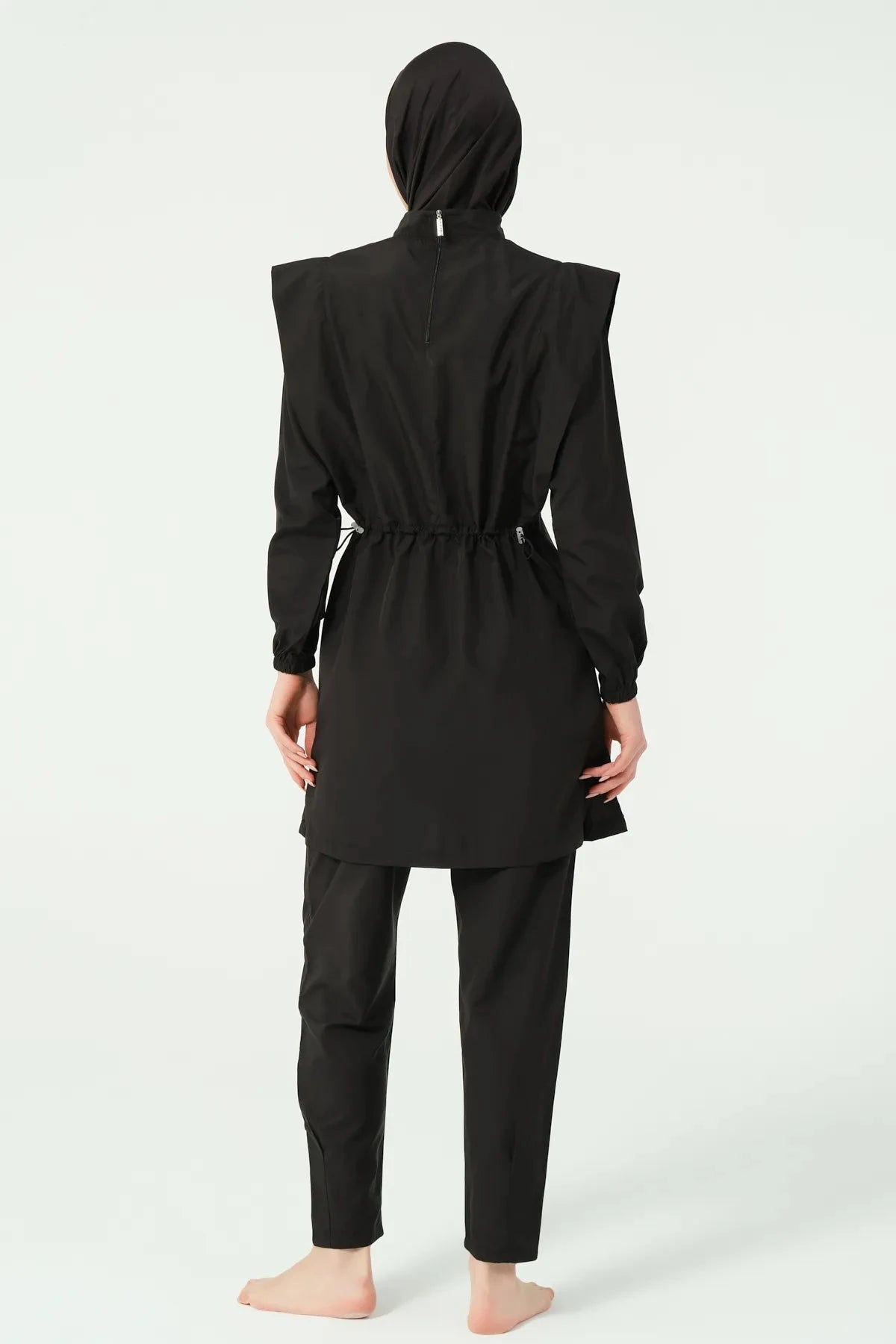 Black hijab swimwear back view showing adjustable waist drawstring on tunic.