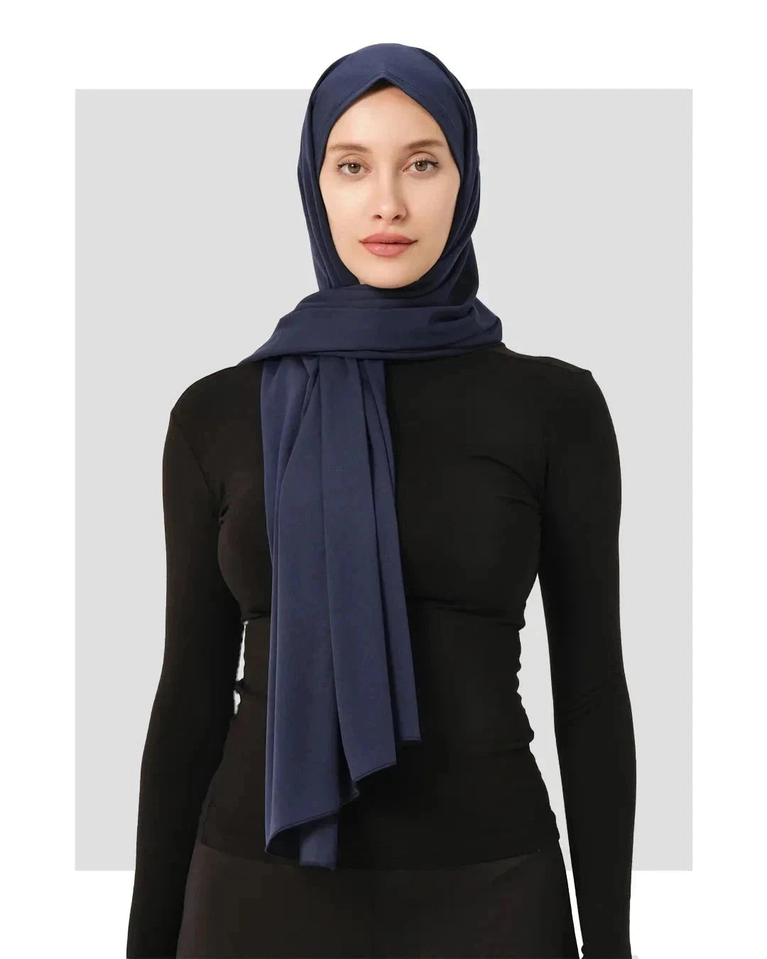 Navy blue swim hijab with a secure fit, worn by a model.
