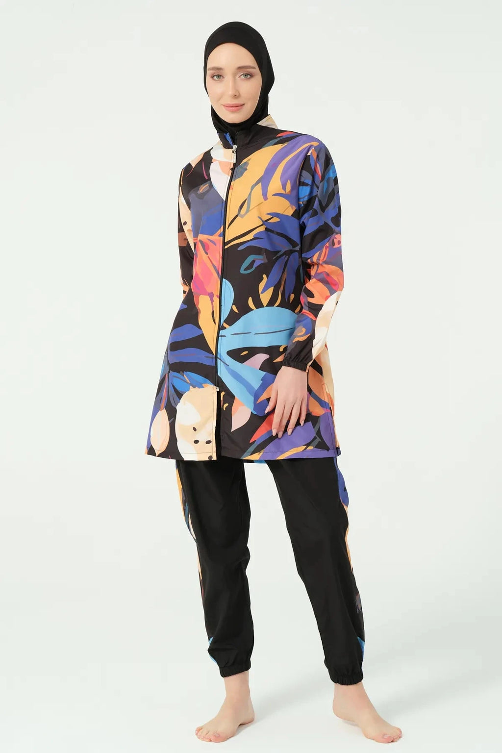 Full length abstract art print burkini with black hijab and pants.