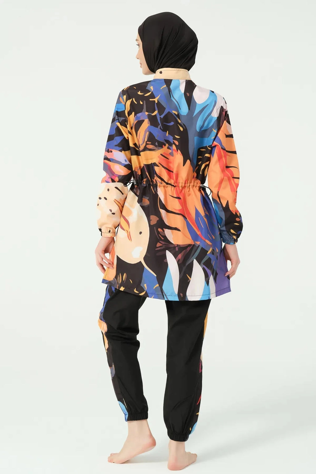 Abstract art print burkini back view showing adjustable waist detail.