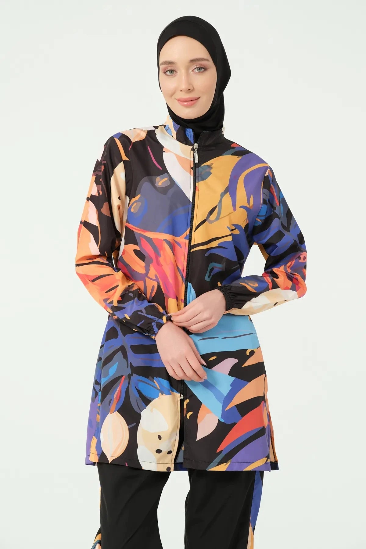 Abstract art print burkini tunic with full-length zipper and black hijab.