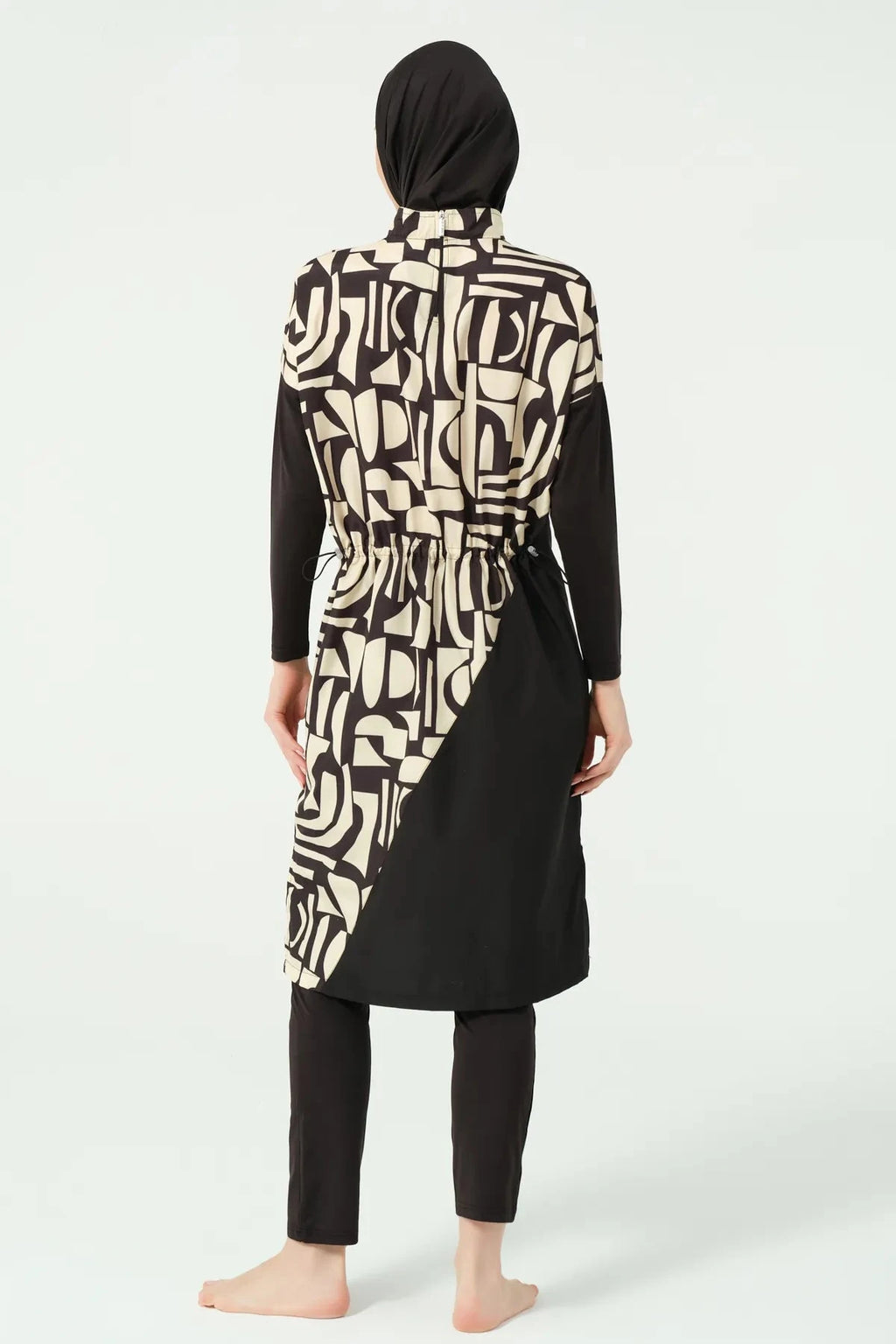 Modest black and beige abstract print swimsuit set back view.