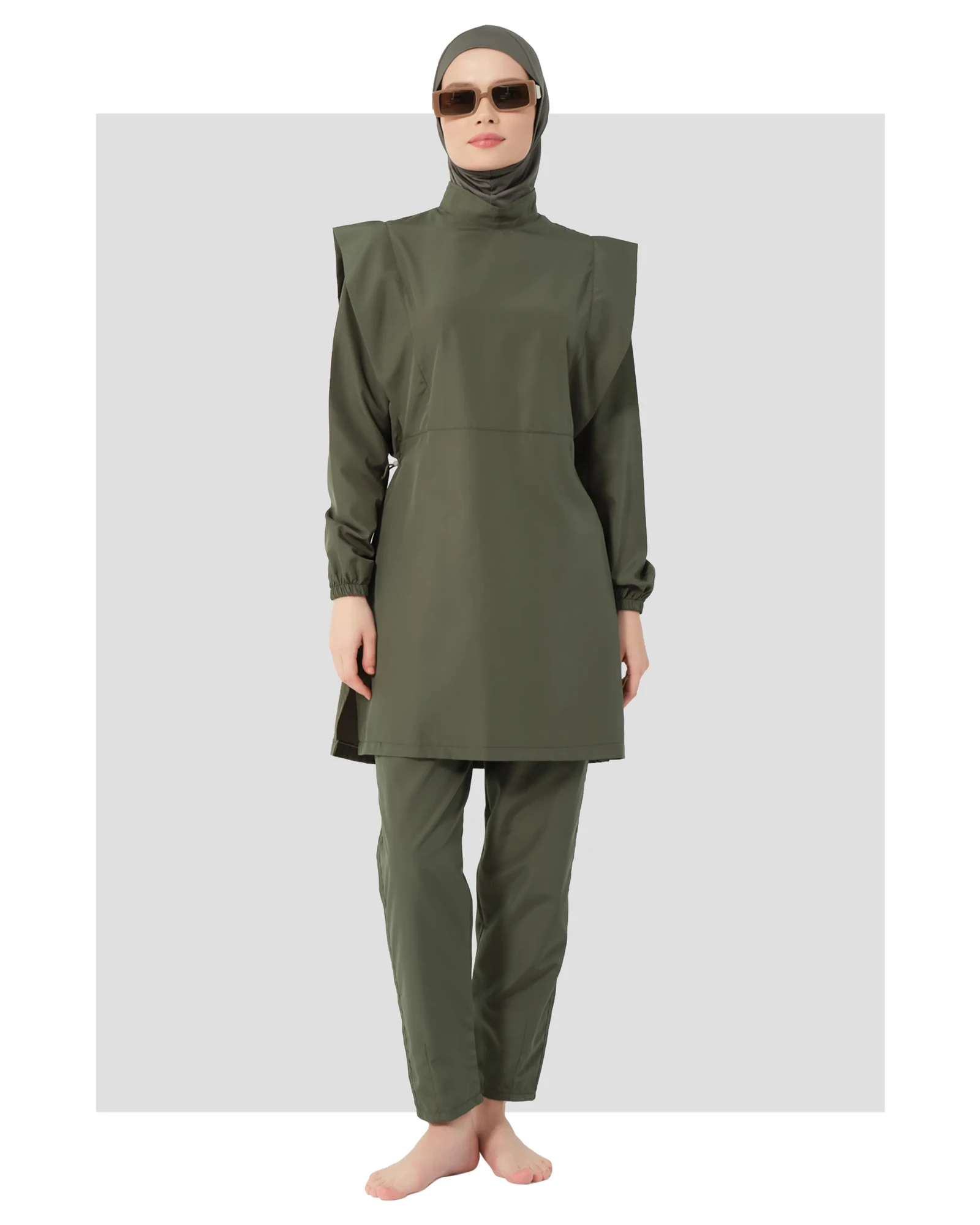 Khaki modest swimsuit set front view with model wearing sunglasses.