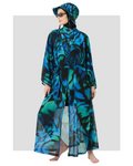 Model in full burkini set with sheer kimono and bucket hat, front view.