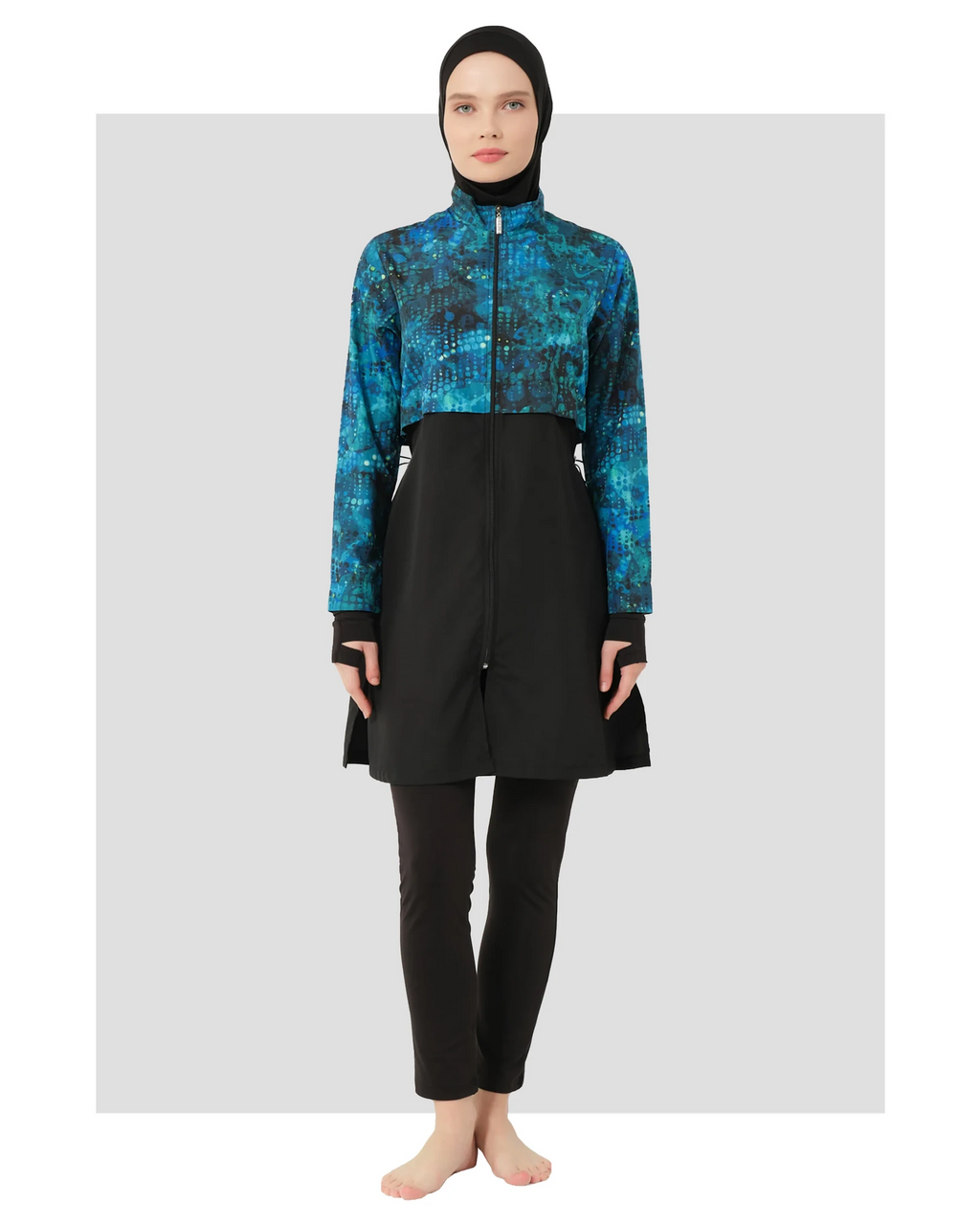 Teal and black hijab swimwear set front view on model.