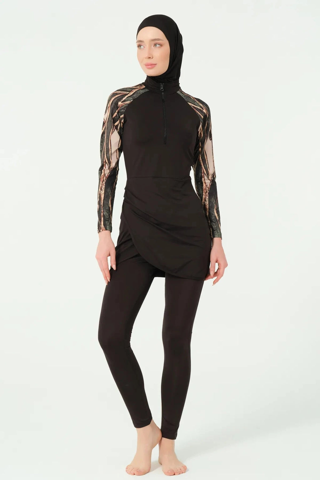 Black modest swimsuit with printed sleeves and wrap skirt, front view.