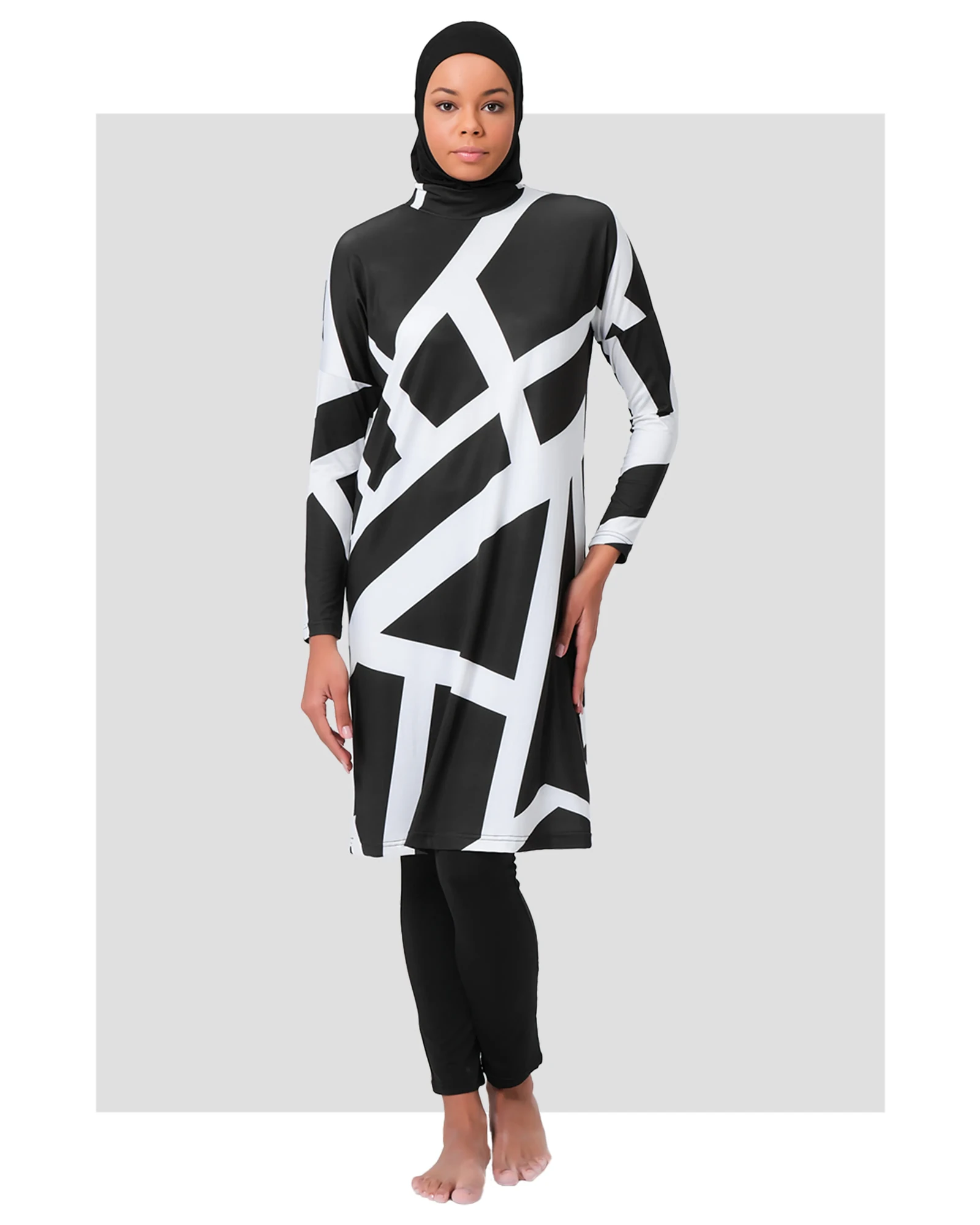 Black and white geometric print burkini set with hijab, front view.