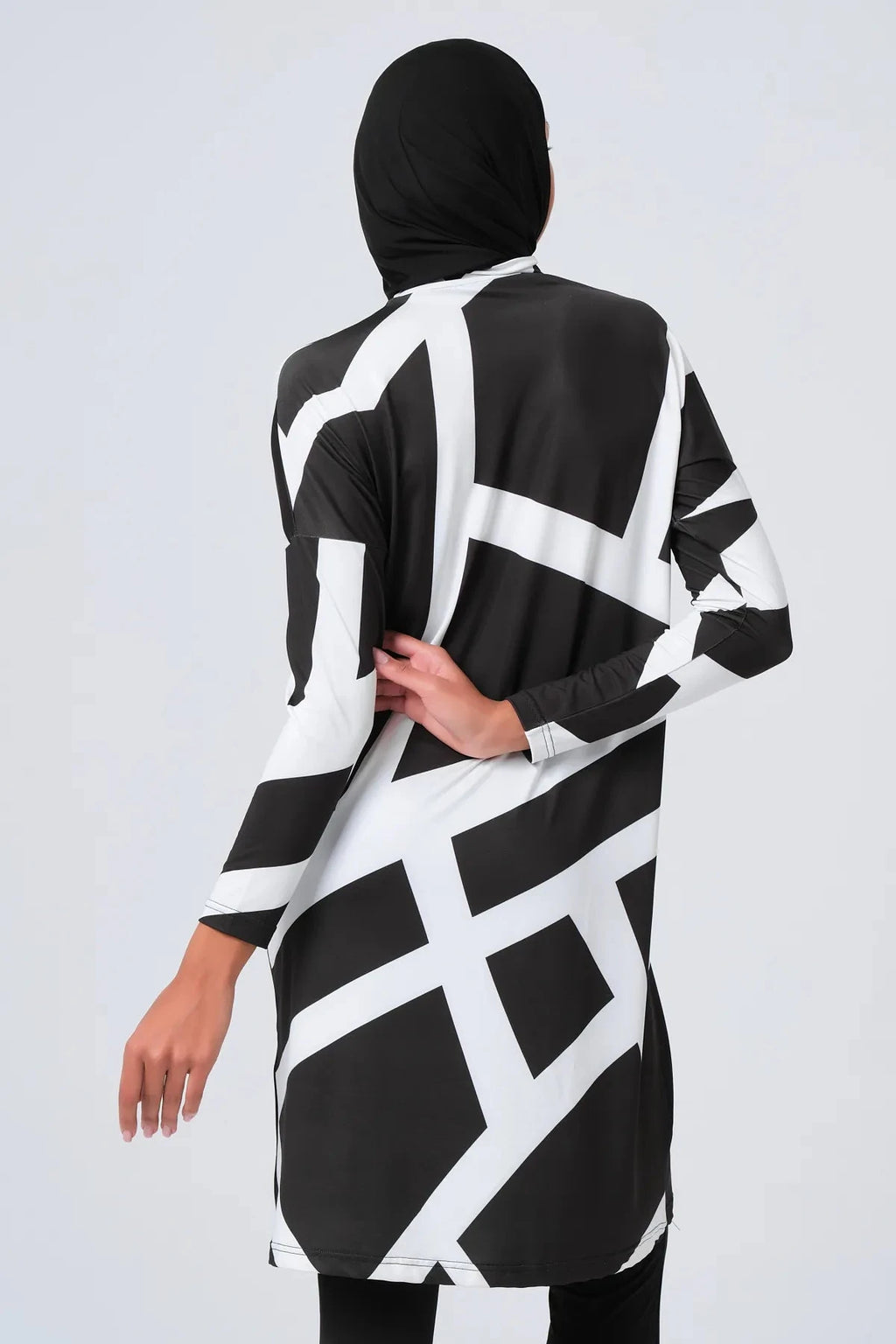 Close-up of the geometric print on the burkini tunic and hijab.