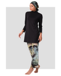 Woman wearing black long-sleeve tunic and tropical print leggings with matching hijab.