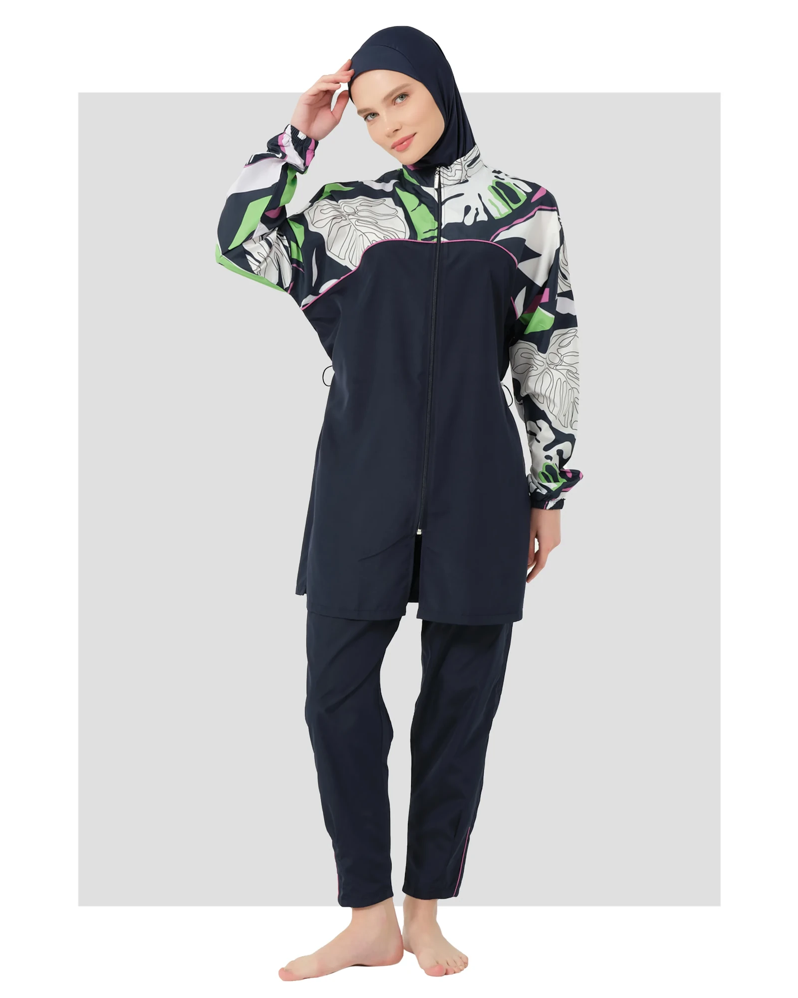 Navy blue burkini with abstract floral print on sleeves, front view.