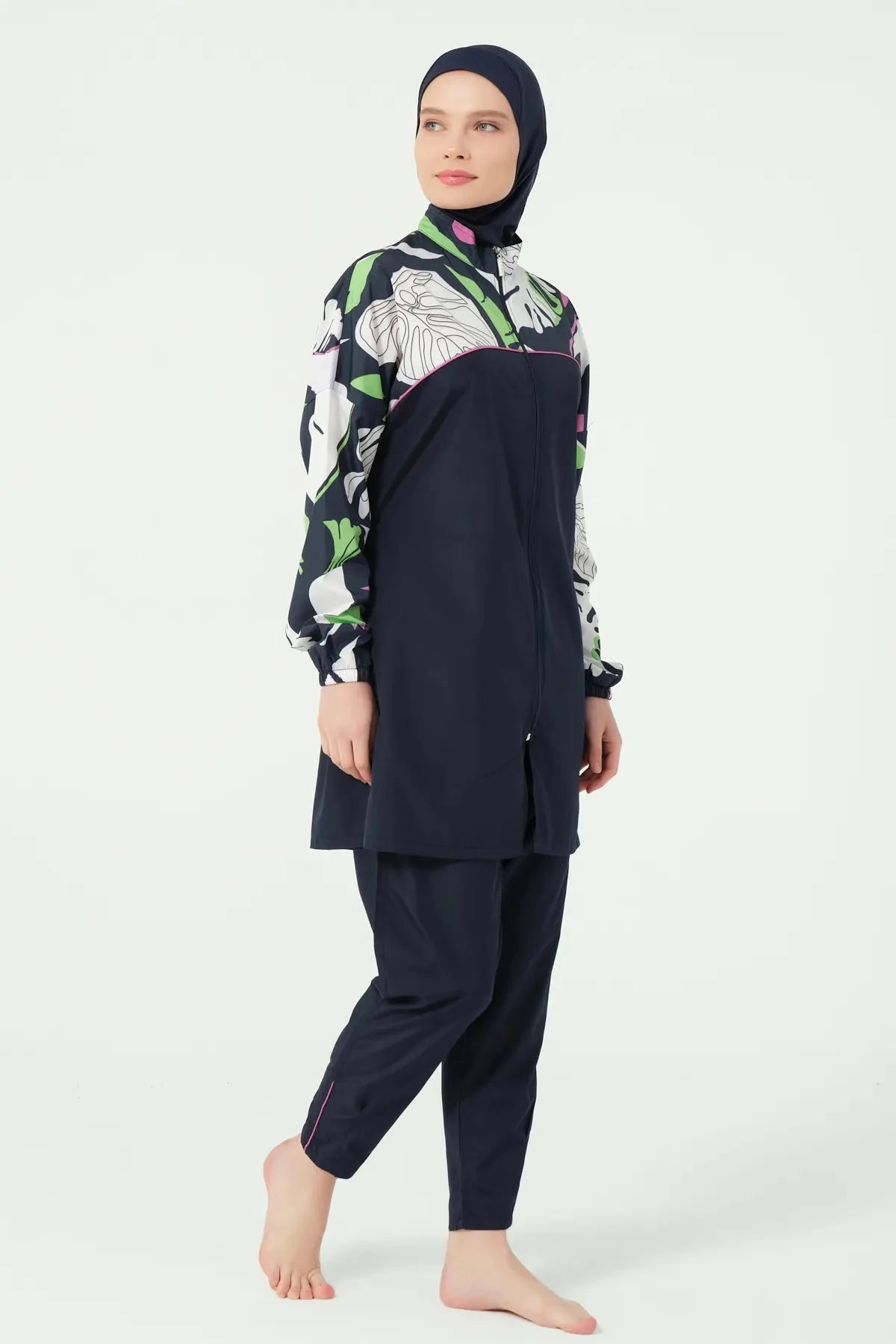 Left side view of navy blue burkini with abstract floral print.