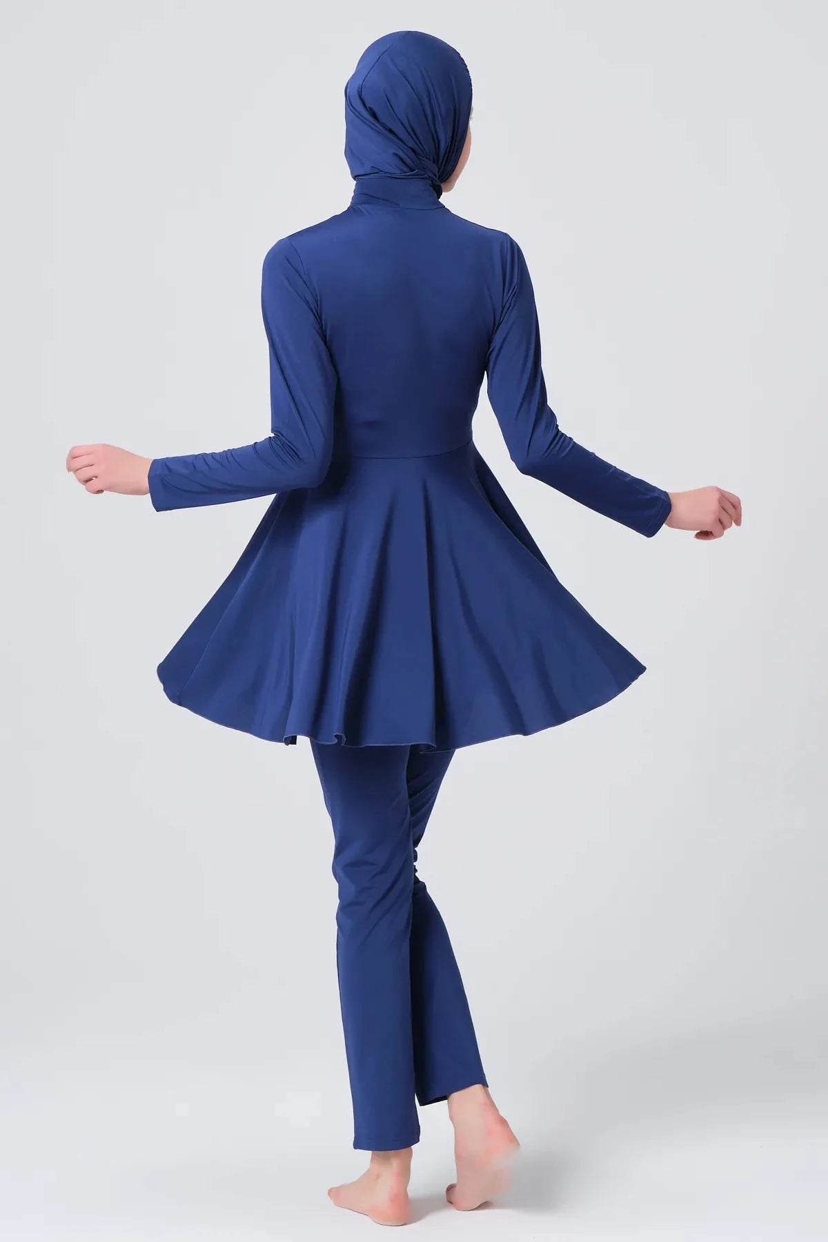 Dark blue modest swimwear set back view on white background.