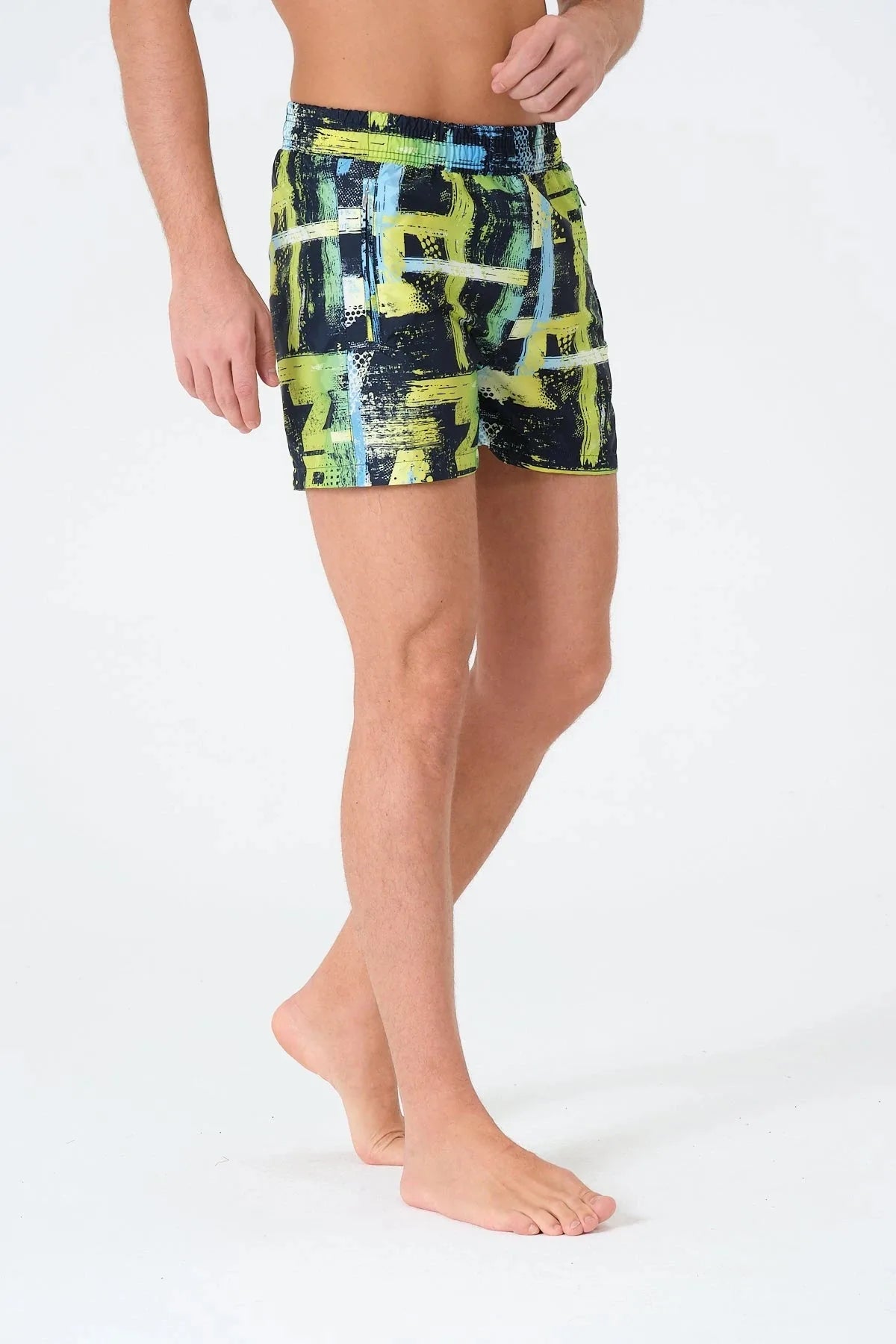 Men's neon abstract print swim trunks, angled front view.
