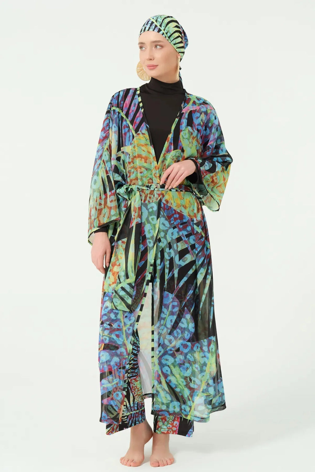 Model standing front in multi-color sheer kimono with belt.