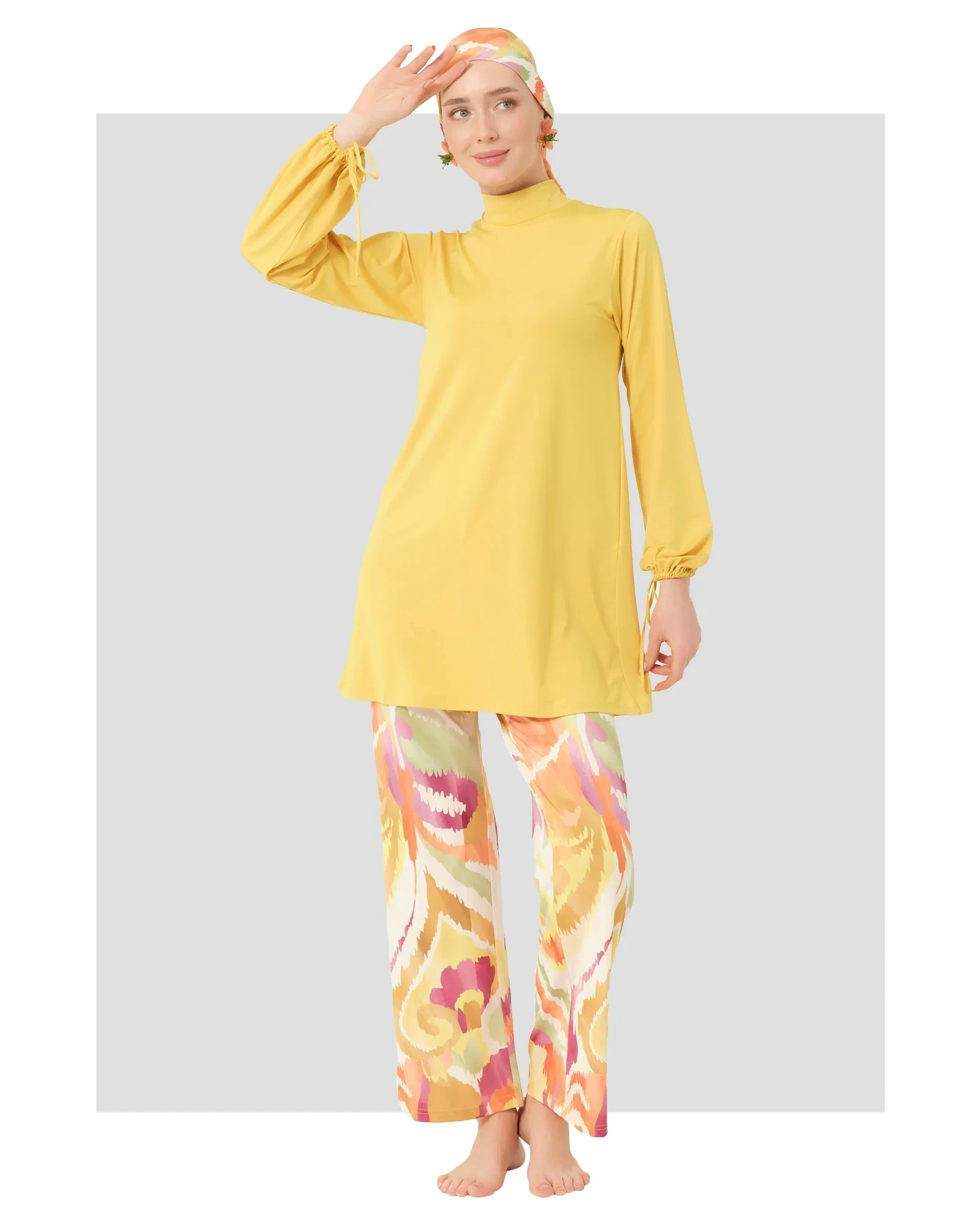 Woman in golden yellow modest swimwear set front pose