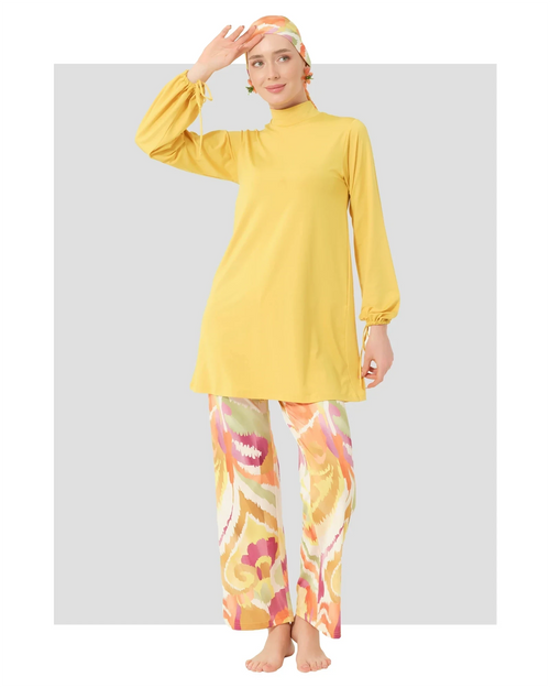 Woman in golden yellow modest swimwear set front pose