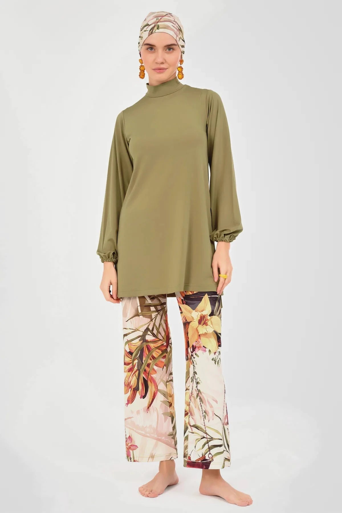 Full front view of model wearing olive green modest swimwear set.