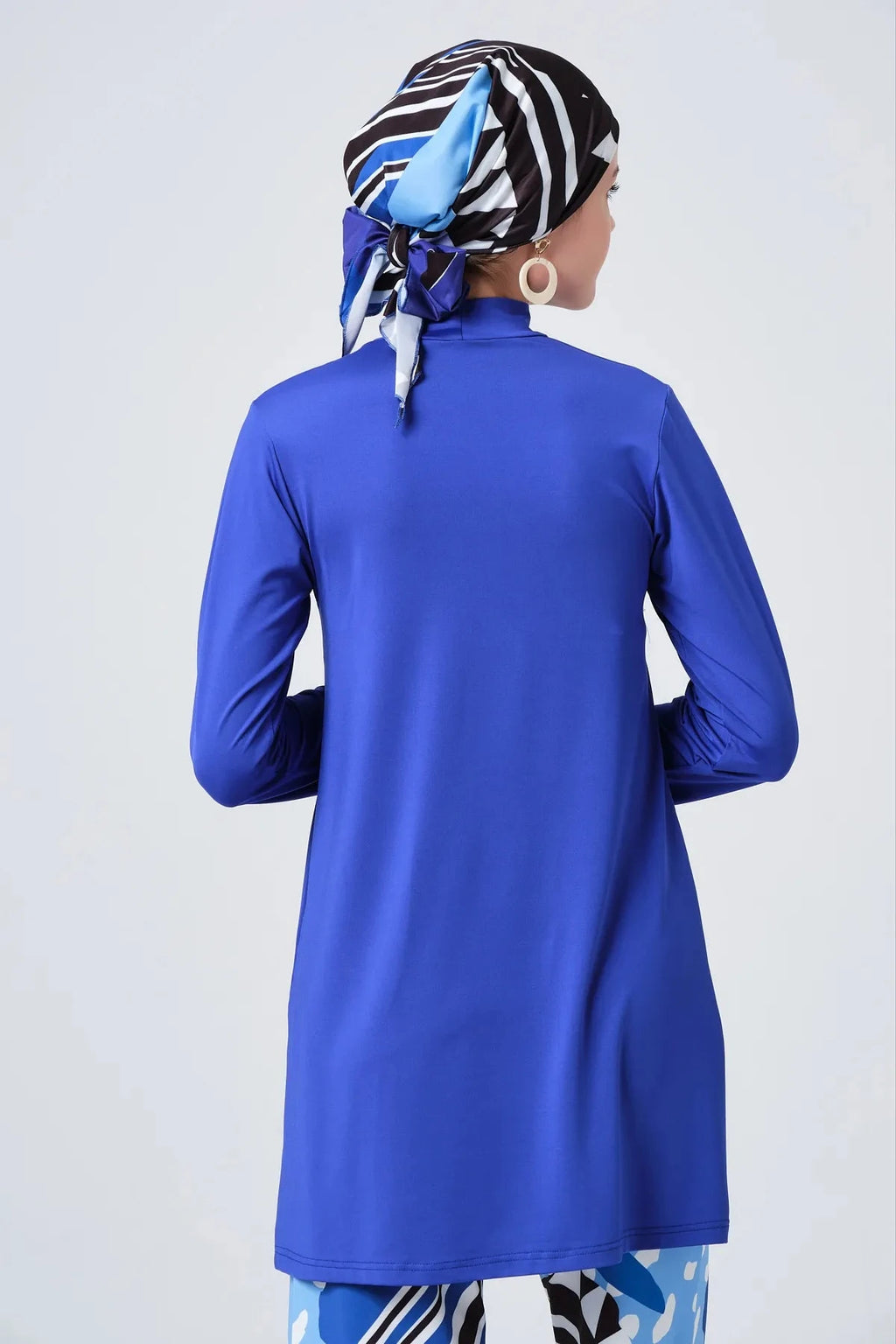Back view close-up of sapphire blue modest burkini tunic and headscarf.