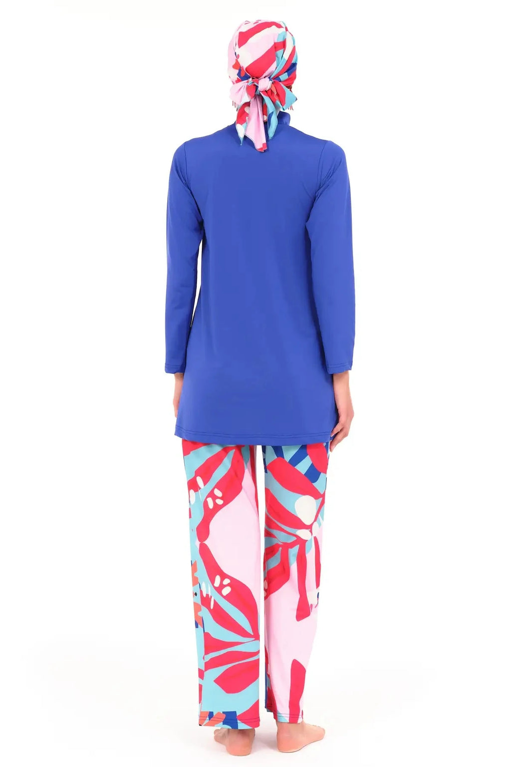 Royal blue modest swimwear set with patterned pants, back view.
