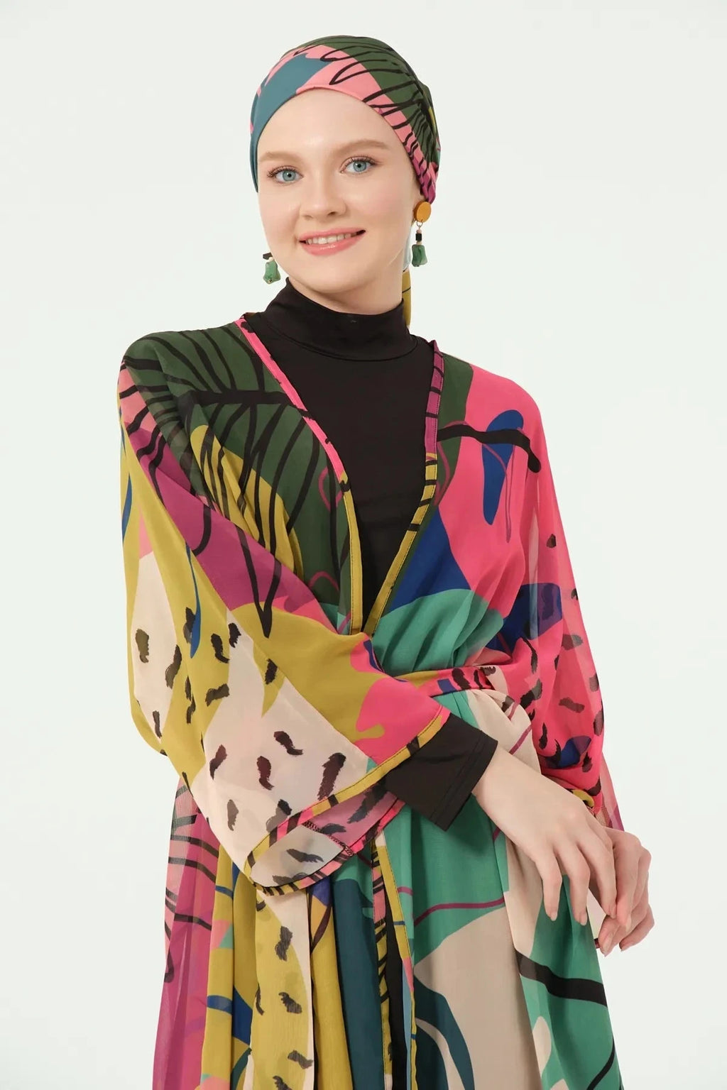 Close-up of model wearing multi-color sheer kimono with black top.