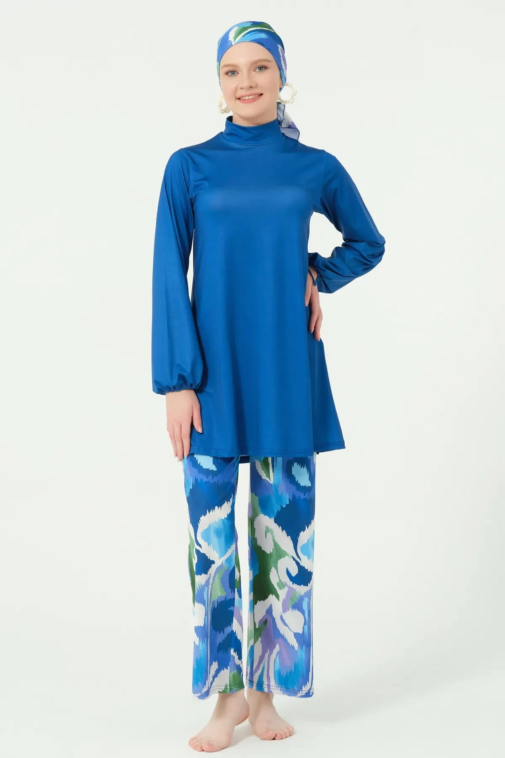 Deep azure burkini top and printed swim pants, front view.