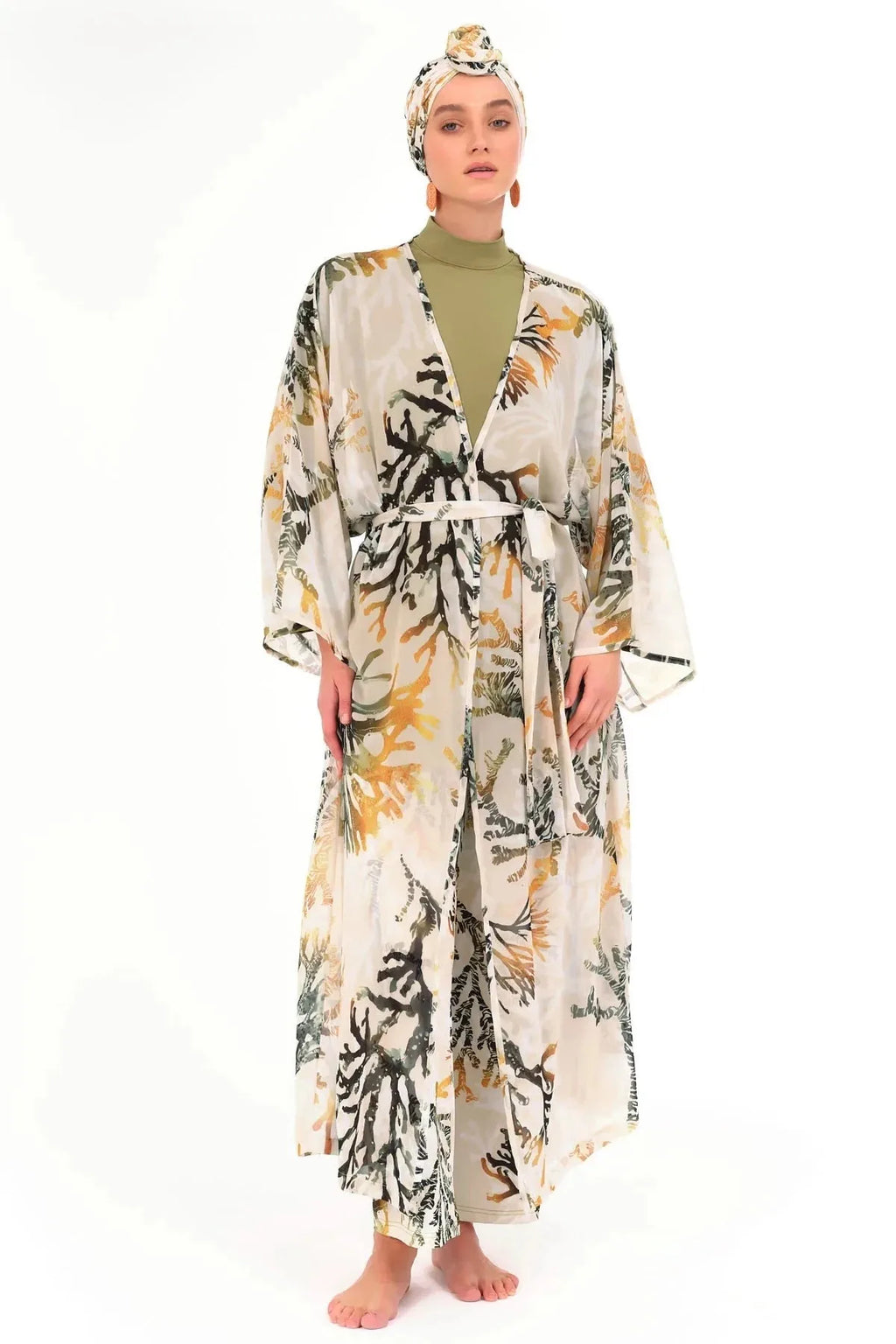 Woman in golden olive kimono swimwear, tied with belt, front view.