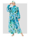 Model in blue and green patterned modest kimono with matching head covering.