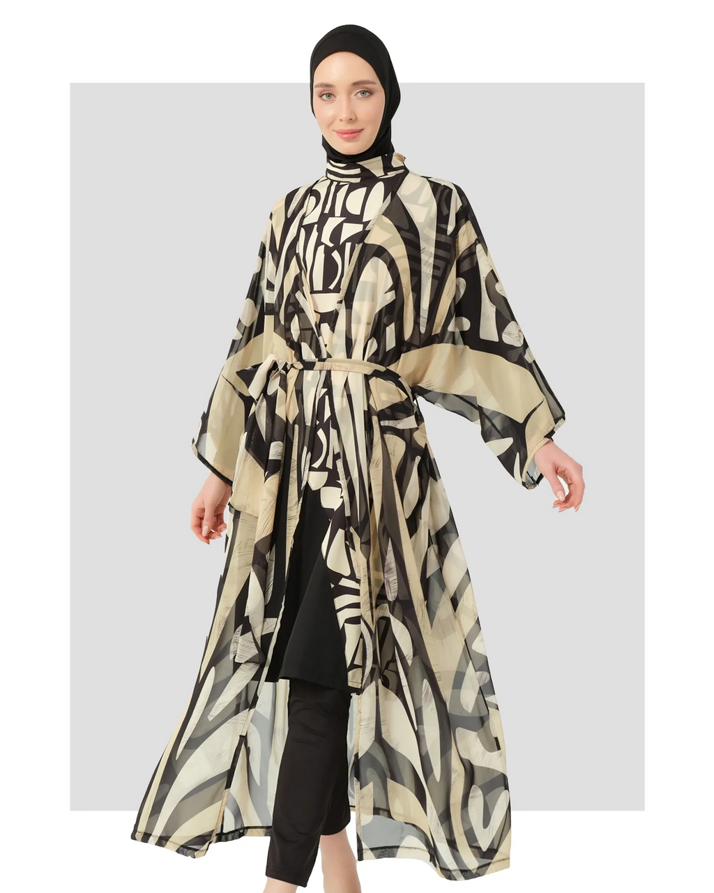 Model wearing black and beige abstract print sheer kimono with tie belt.