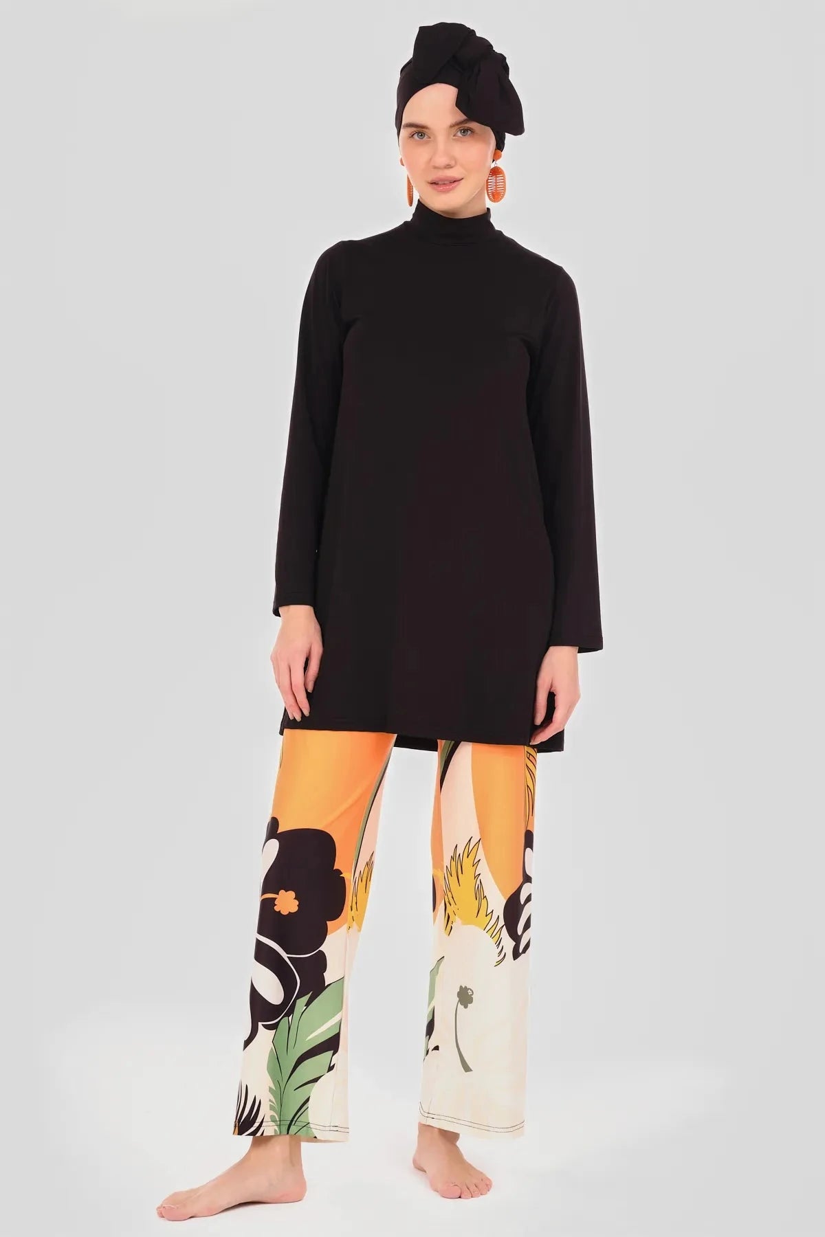 Noir Tropic modest swimwear set without kimono, showing black tunic and tropical pants