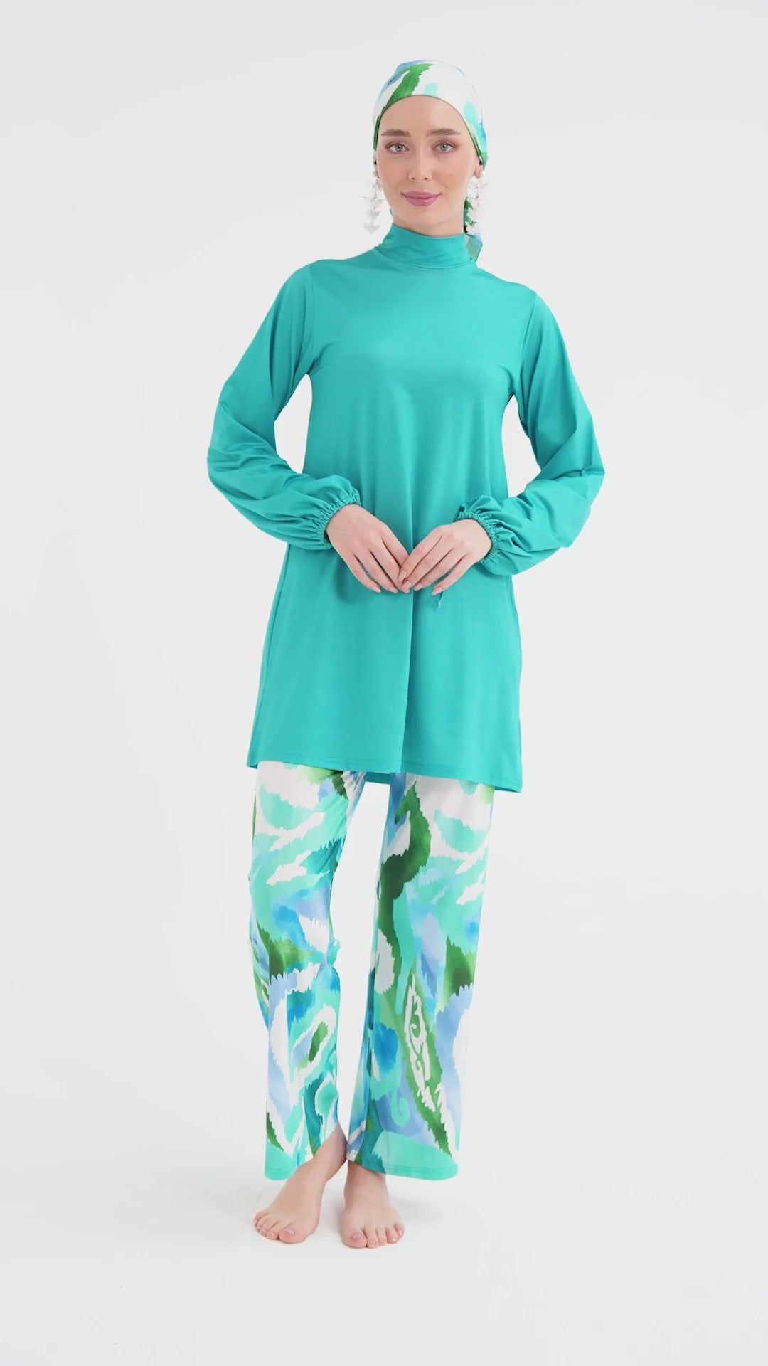 Refreshing Aqua Tones in Modest Swimwear